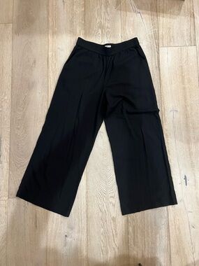 Marine Layer Black Wide-Leg Trousers with Subtle Yellow-Red Tag Detail
